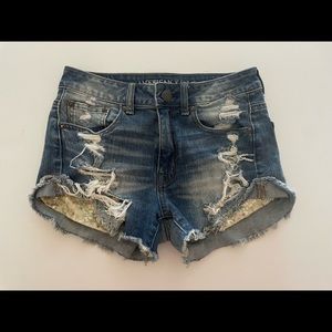 Jean shorts with gold sparkle pockets